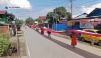 Warga RT 1 RW 2 Girimulyo Bentangkan Bendera Merah Putih 200 Meter Sambut HUT RI ke-80