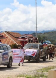 Kawal Karnaval Hardiknas, Polres Paniai Pastikan Ratusan Pelajar Berpawai Aman dan Lancar
